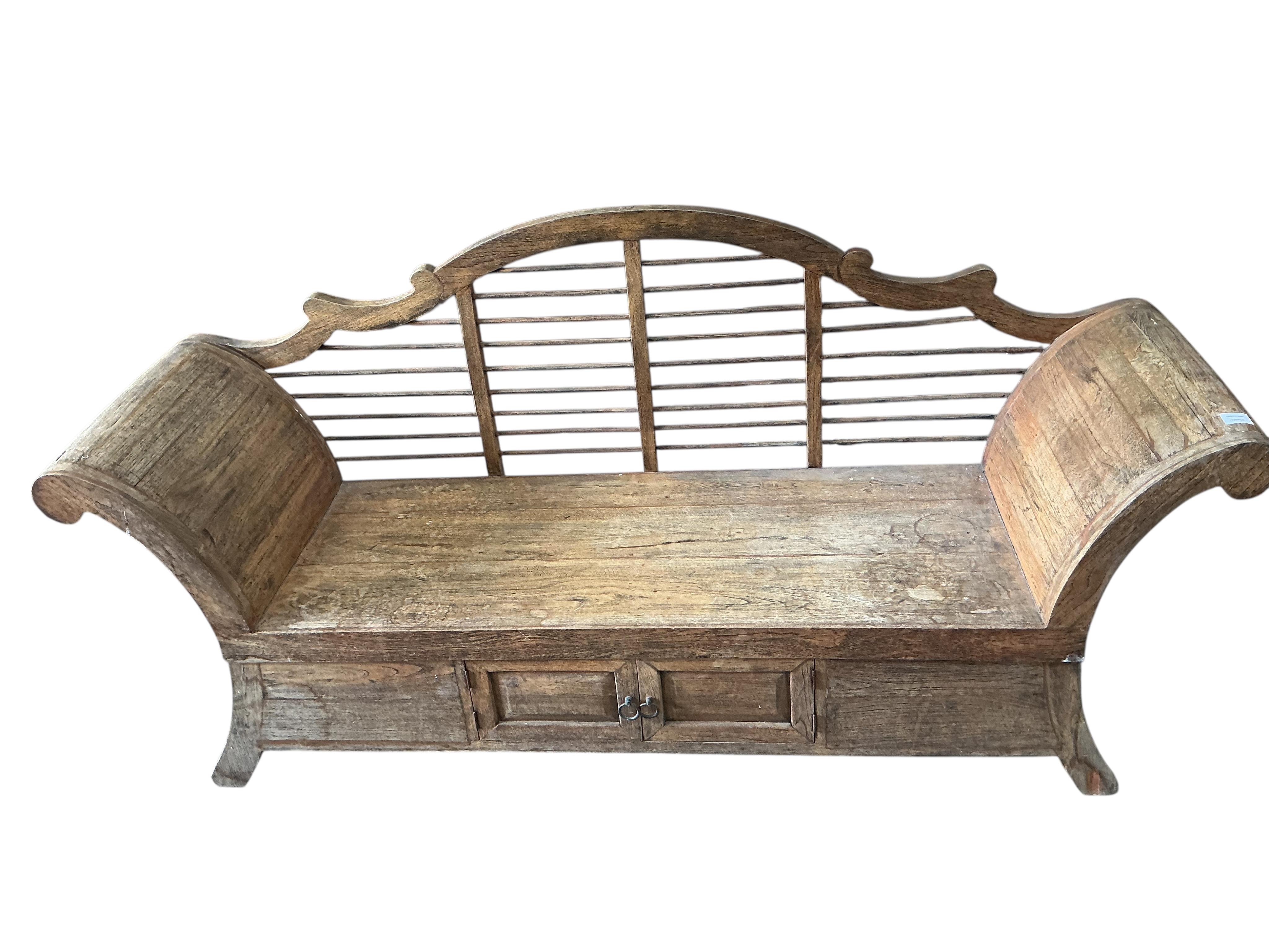 A Burmese hardwood settee, width 189cm, depth 54cm, height 93cm